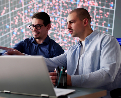 Man in cyber data team monitoring computer technology in office